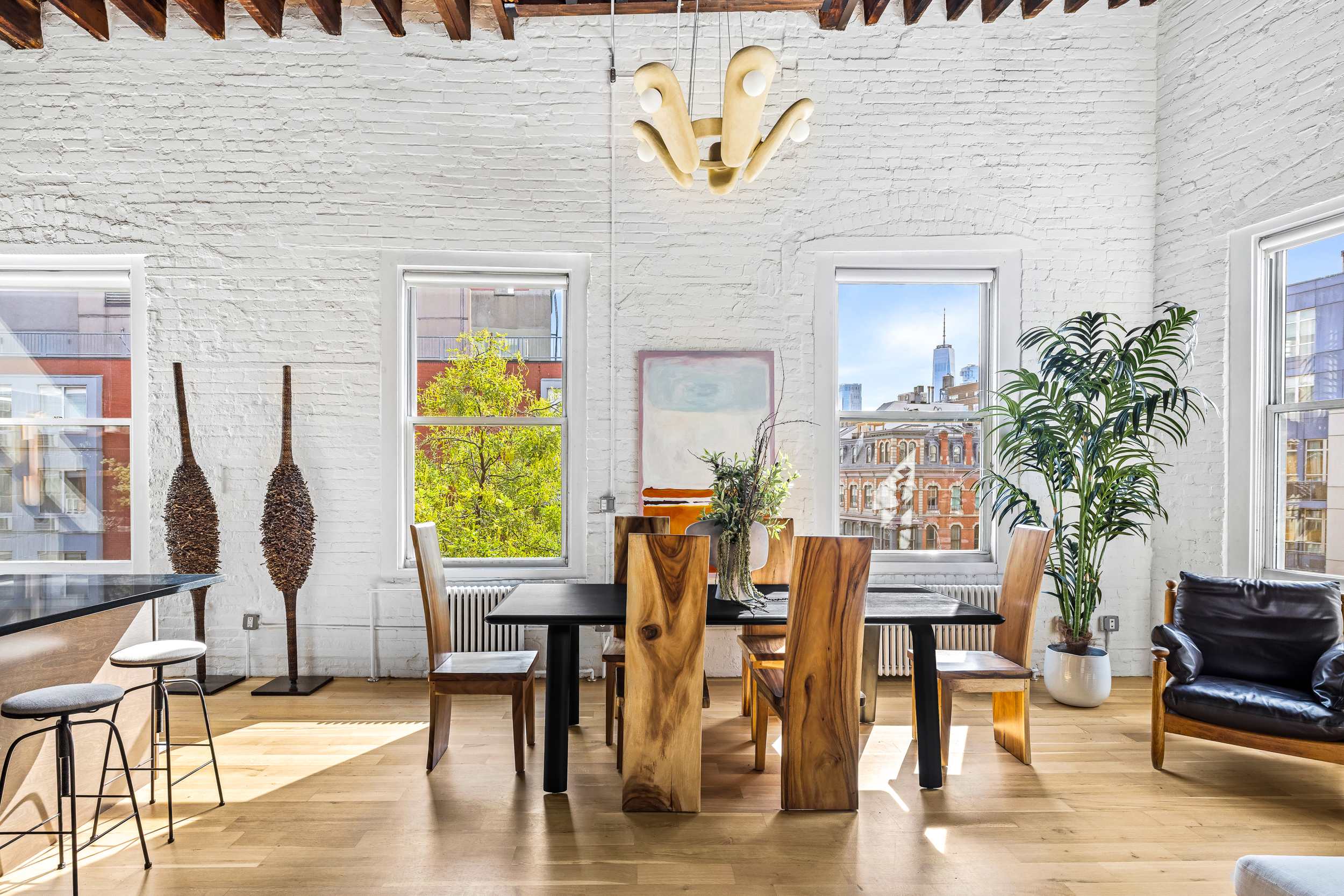 325 Bowery, Unit PH Manhattan, NY 10003 - Photo 6 of 17 a view of a dinning tables and chair in the patio