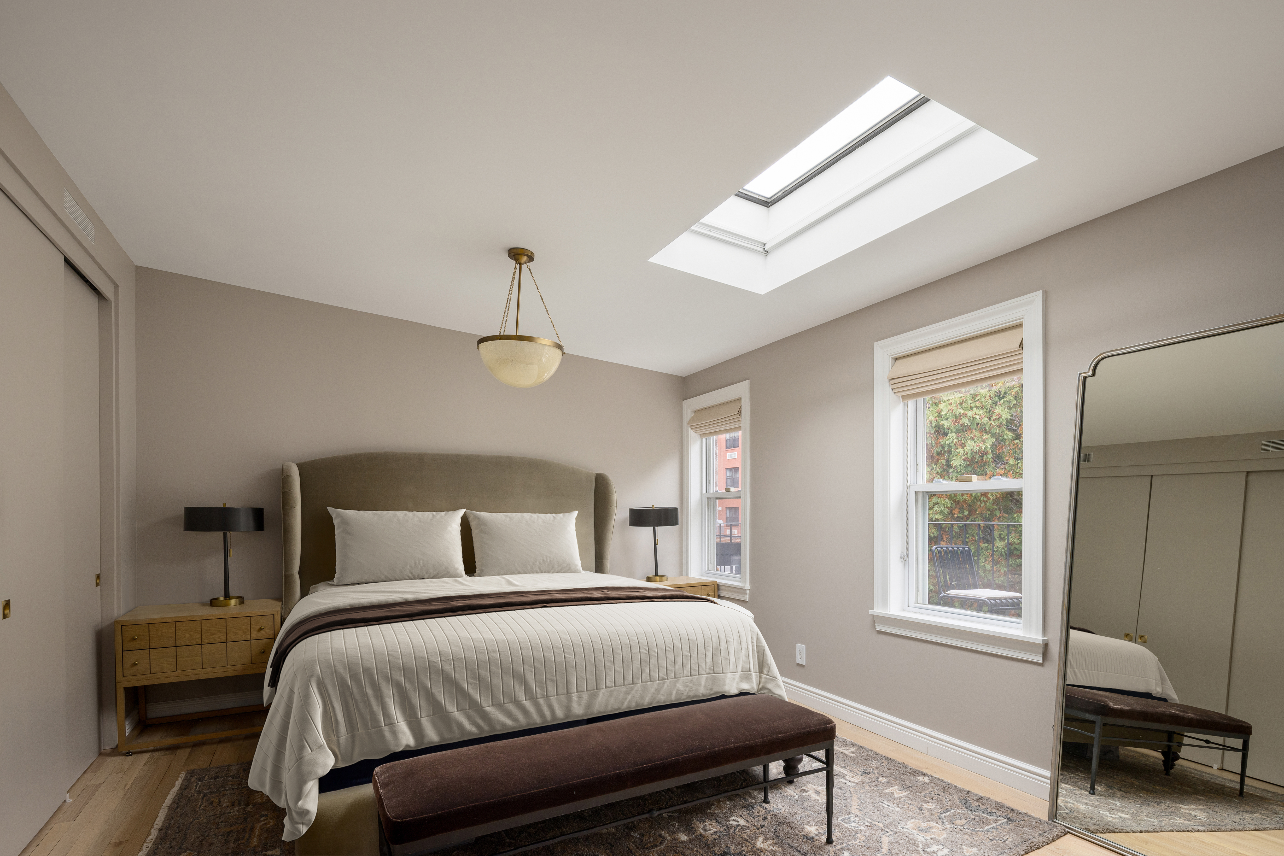 309 Pacific Street Brooklyn, NY 11201 - Photo 10 of 22 a bedroom with a large bed and a window