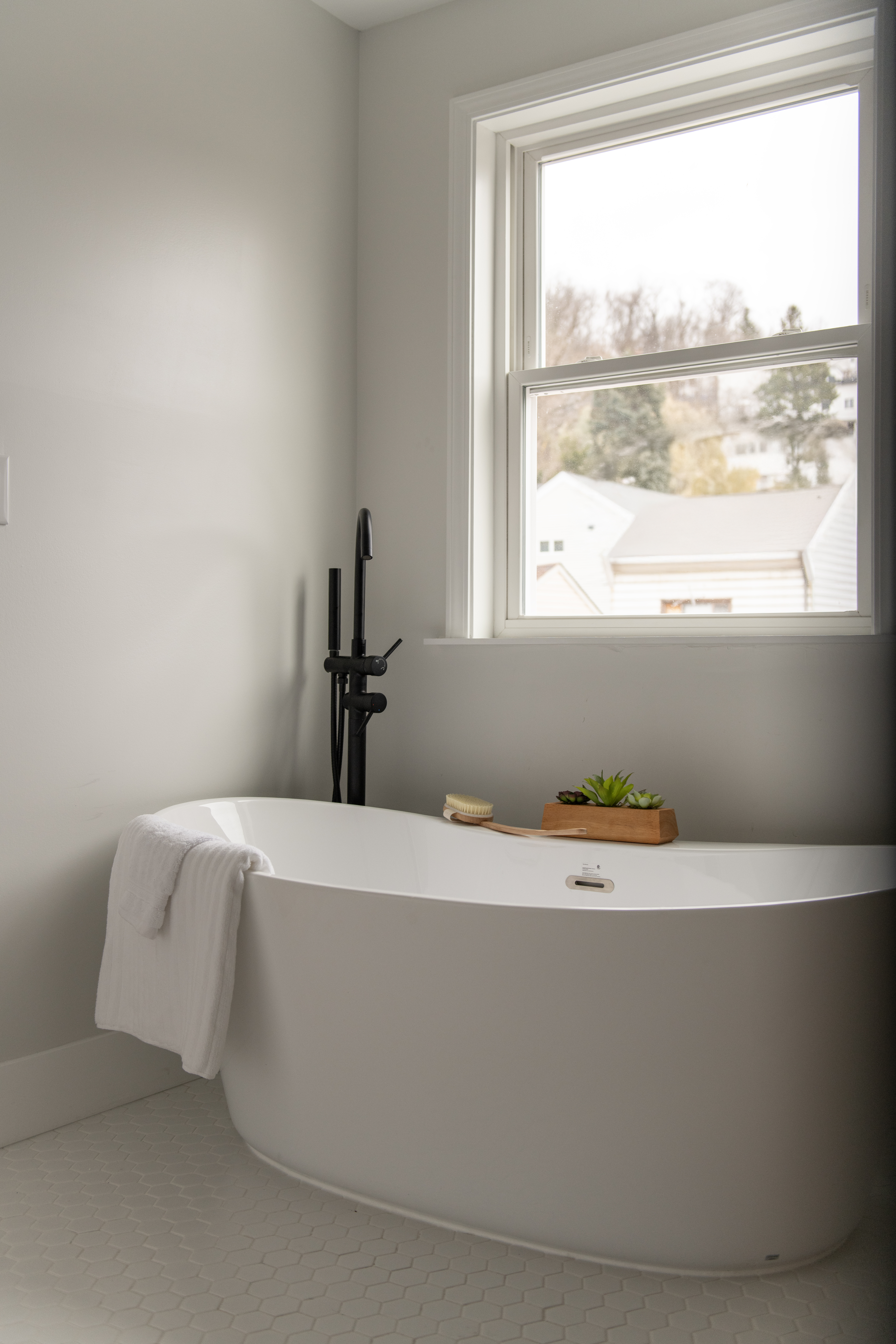 5412 Carnegie Street Pittsburgh, PA 15201 - Photo 45 of 55 a bed sitting in a bedroom next to a window