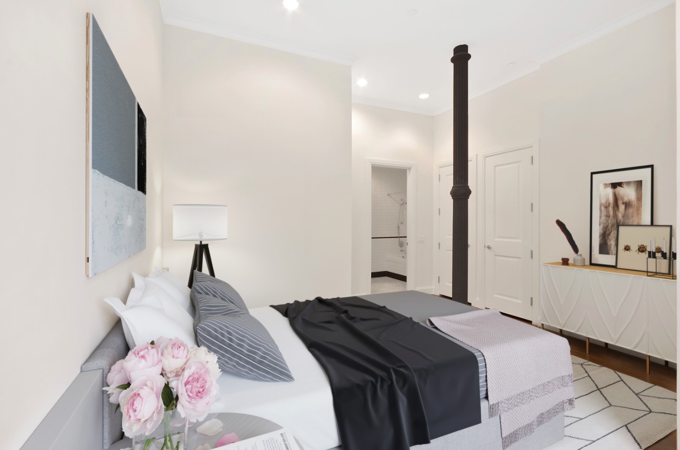 655 6th Avenue, Unit 4A Manhattan, NY 10010 - Photo 3 of 6 a bedroom with a bed and a potted plant