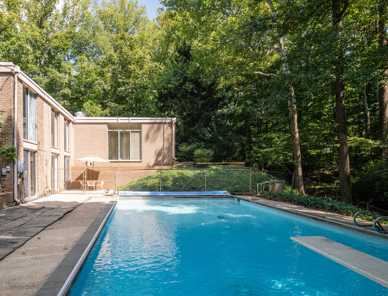 7101 Crail Drive Bethesda, MD 20817 - Photo 1 of 15 a view of a house with backyard and sitting area
