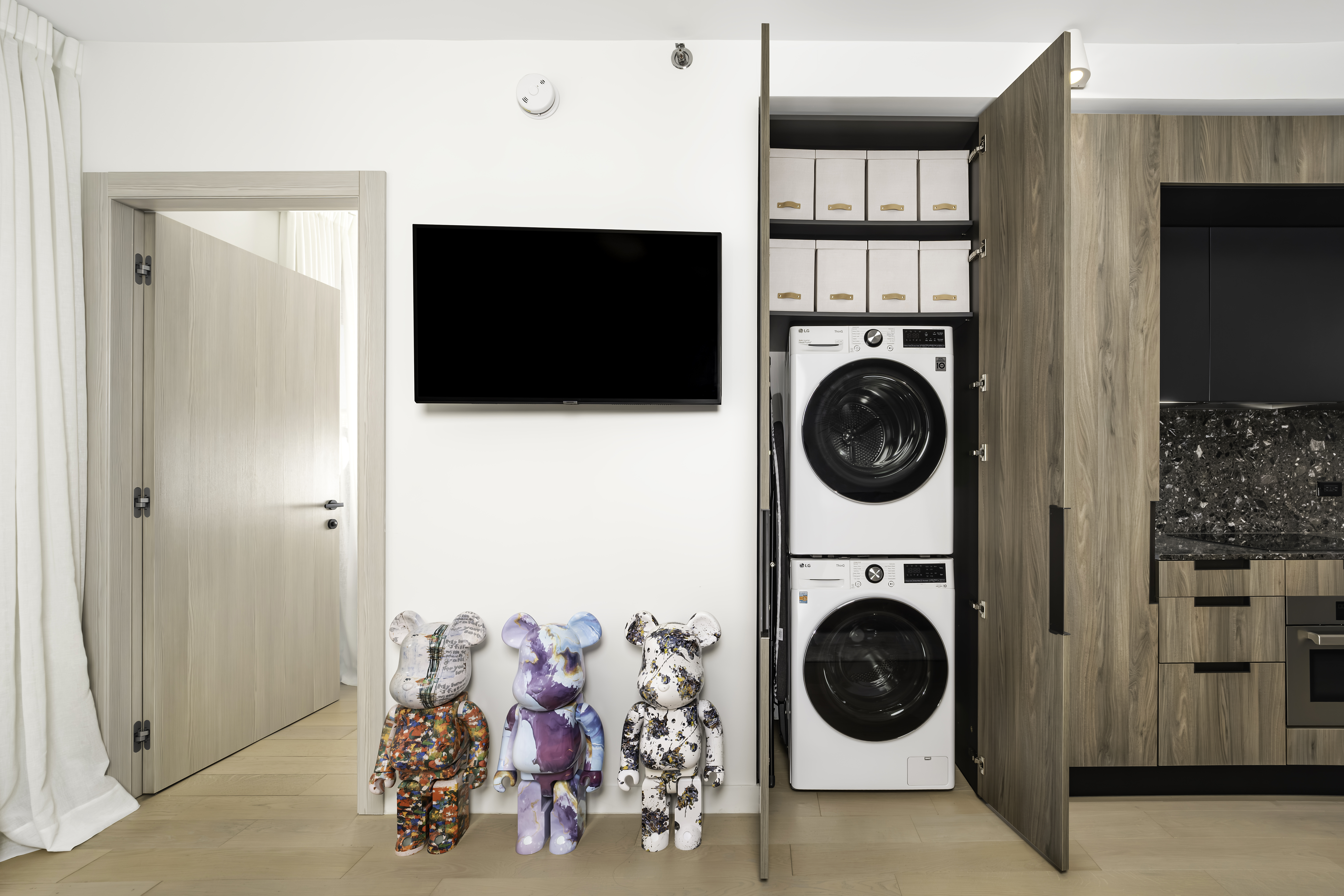 181 East 101st Street, Unit 701 Manhattan, NY 10029 - Photo 4 of 16 a view of a storage and utility room with washer and dryer