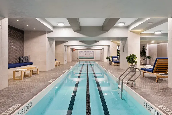 a view of a living room and kitchen