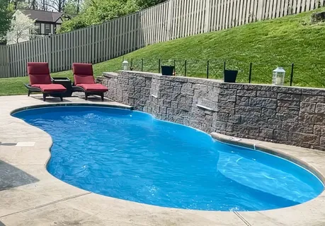 a view of a swimming pool with a patio
