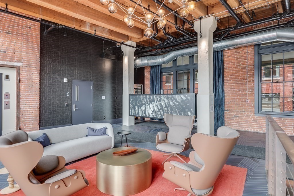 319 A Street, Unit 211 Boston, MA 02210 - Photo 18 of 24 a outdoor living space with furniture and a window