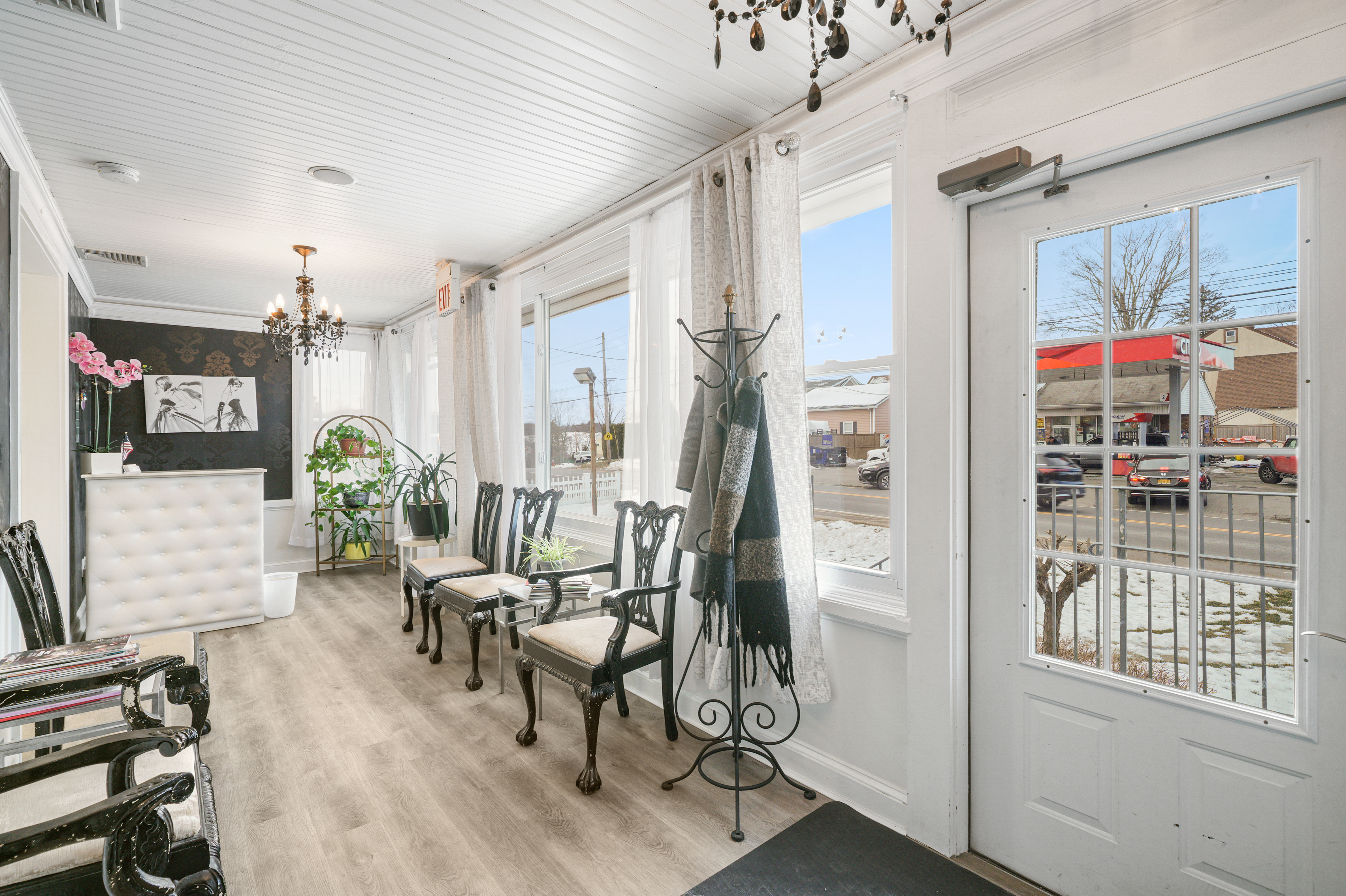 118 Columbus Avenue Valhalla, NY 10595 - Photo 2 of 15 a living room with furniture and a chandelier