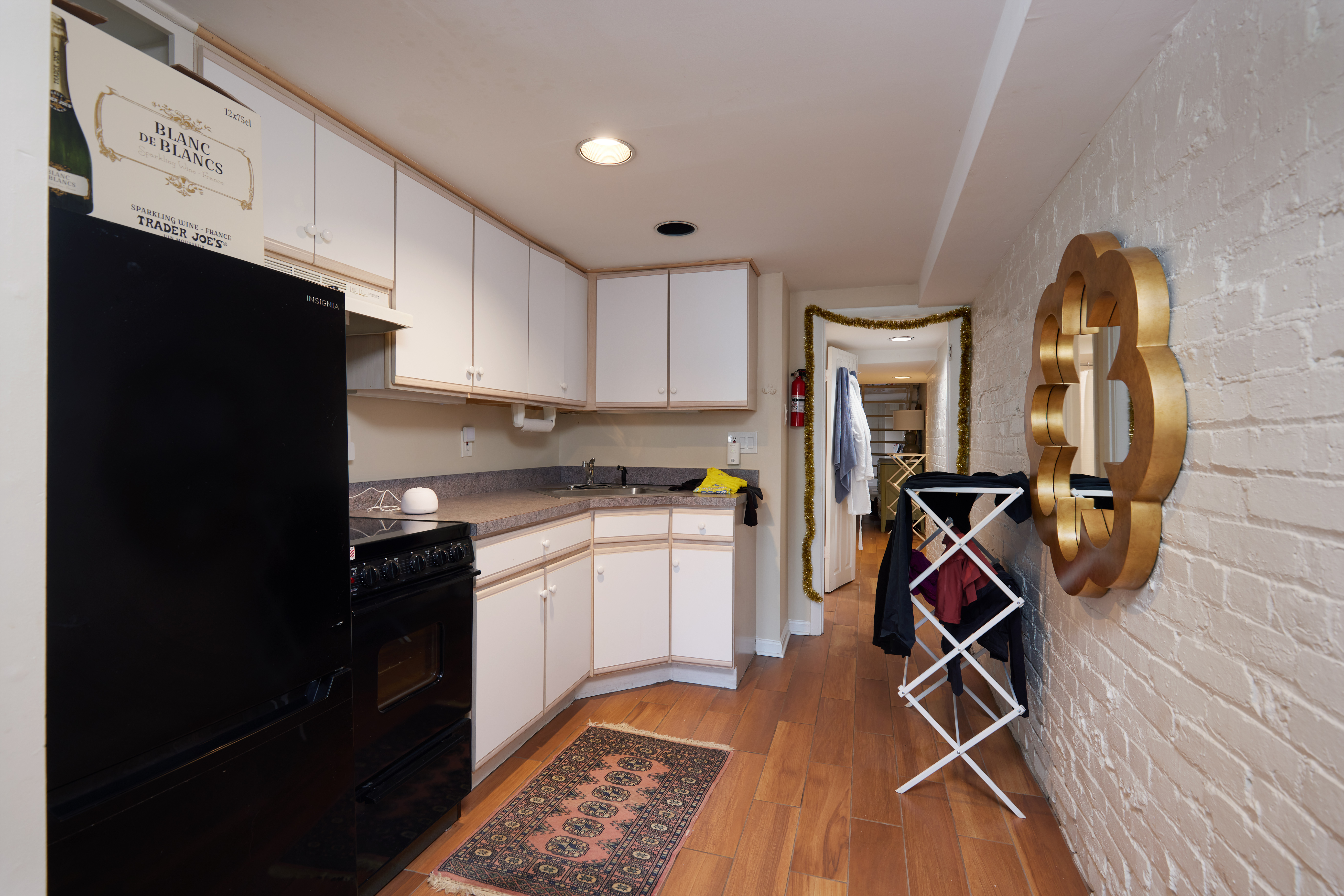 3420 R Street Northwest Washington, DC 20007 - Photo 17 of 53 a kitchen with a refrigerator a sink and cabinets