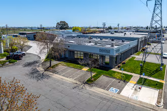 5705 Power Inn Road Sacramento, CA 95824 - Photo 2 of 8 an aerial view of a house with a garden and plants