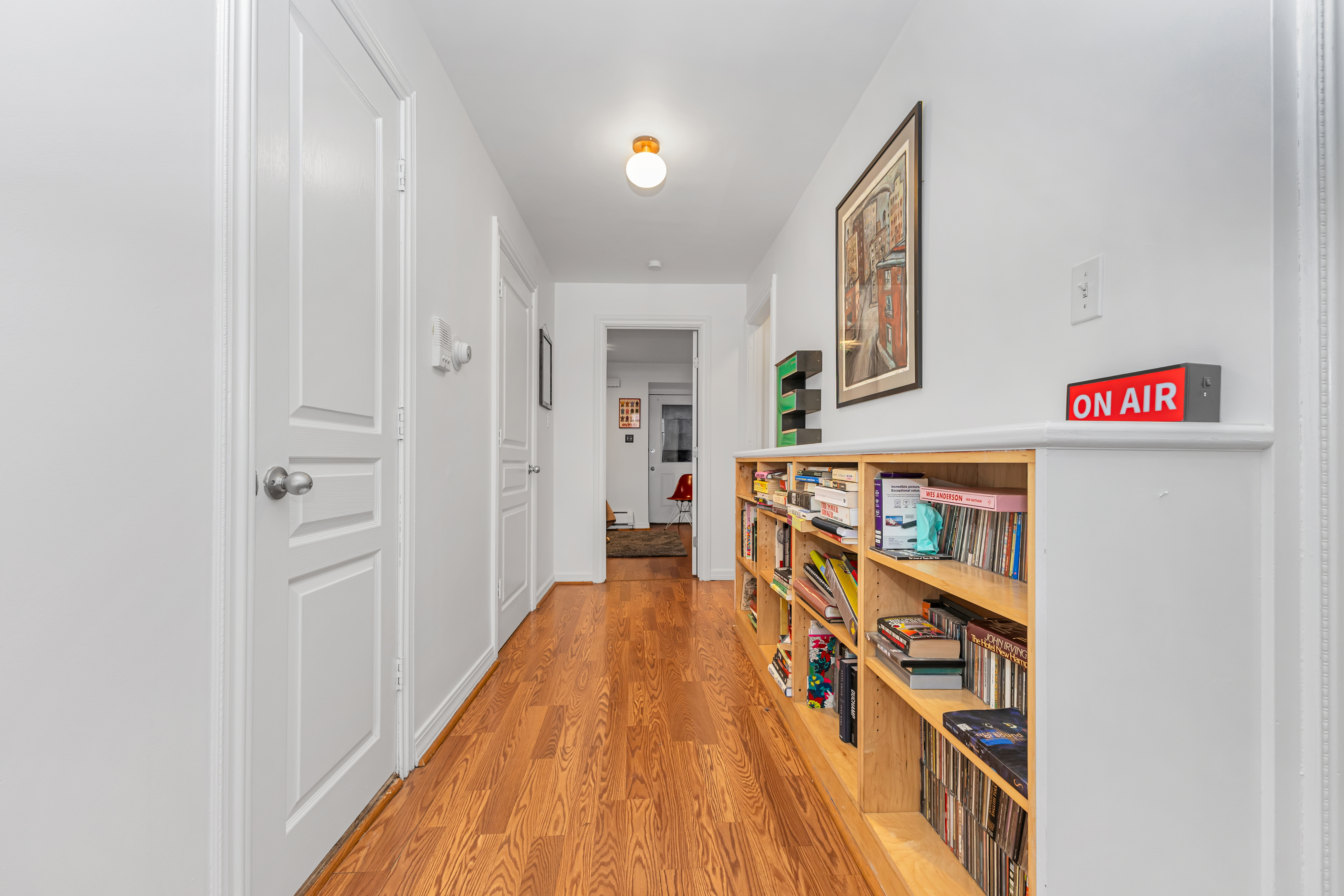 503 Clinton Street, Unit 1 Brooklyn, NY 11231 - Photo 12 of 16 a view of a hallway with wooden floor and staircase