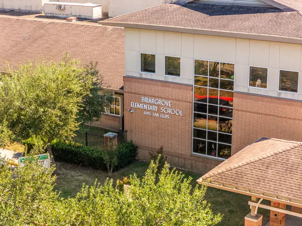 a view of a building with a swimming pool