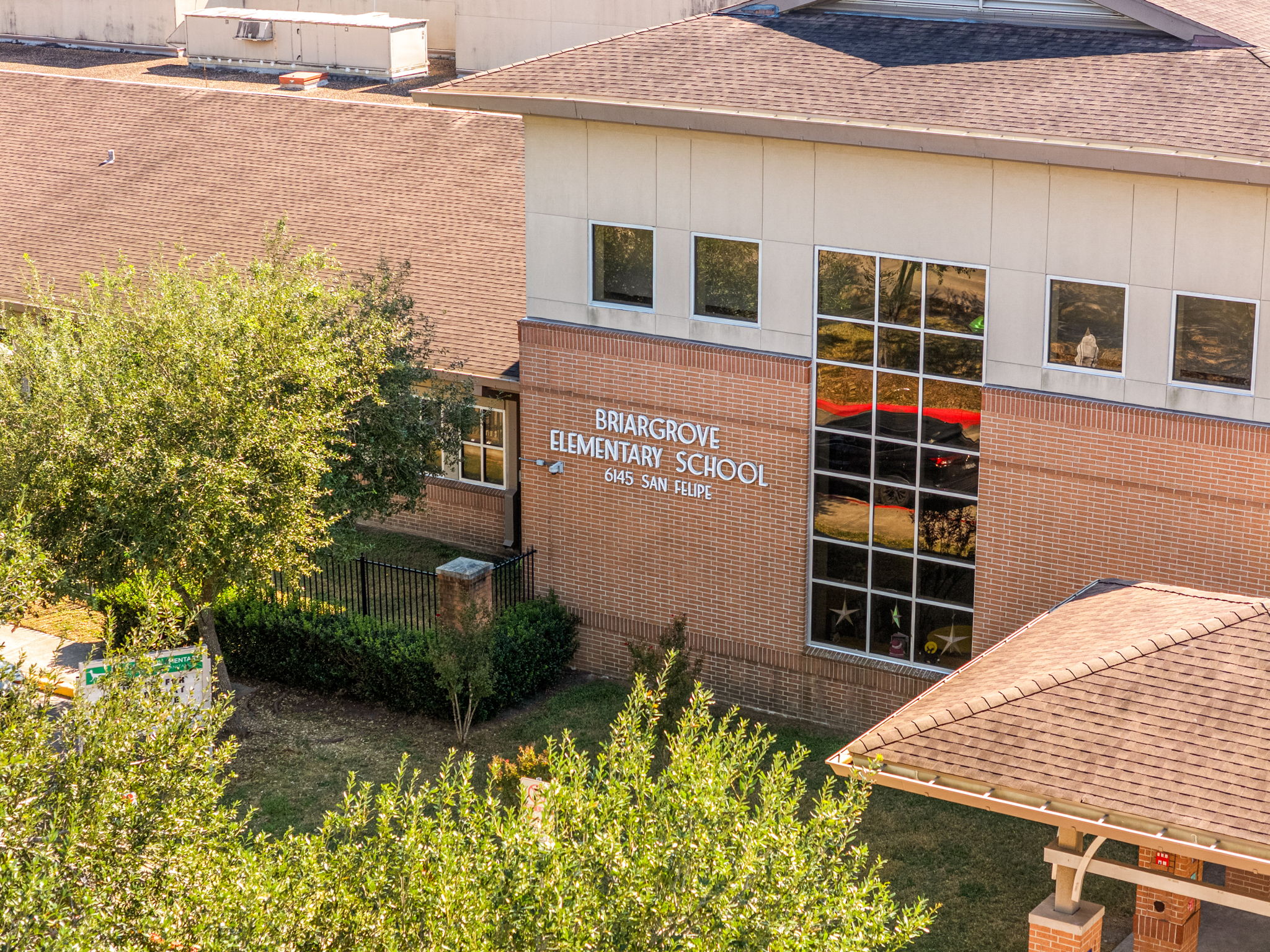 6213 Overbrook Lane Houston, TX 77057 - Photo 21 of 27 a front view of a house with a yard