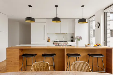 a kitchen with a cabinets and window