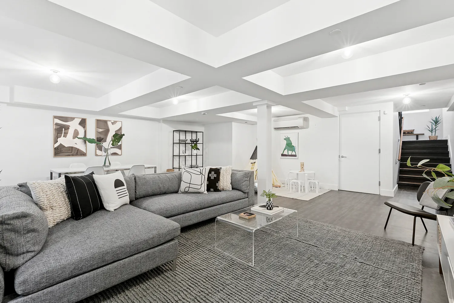 a living room with furniture and a couch