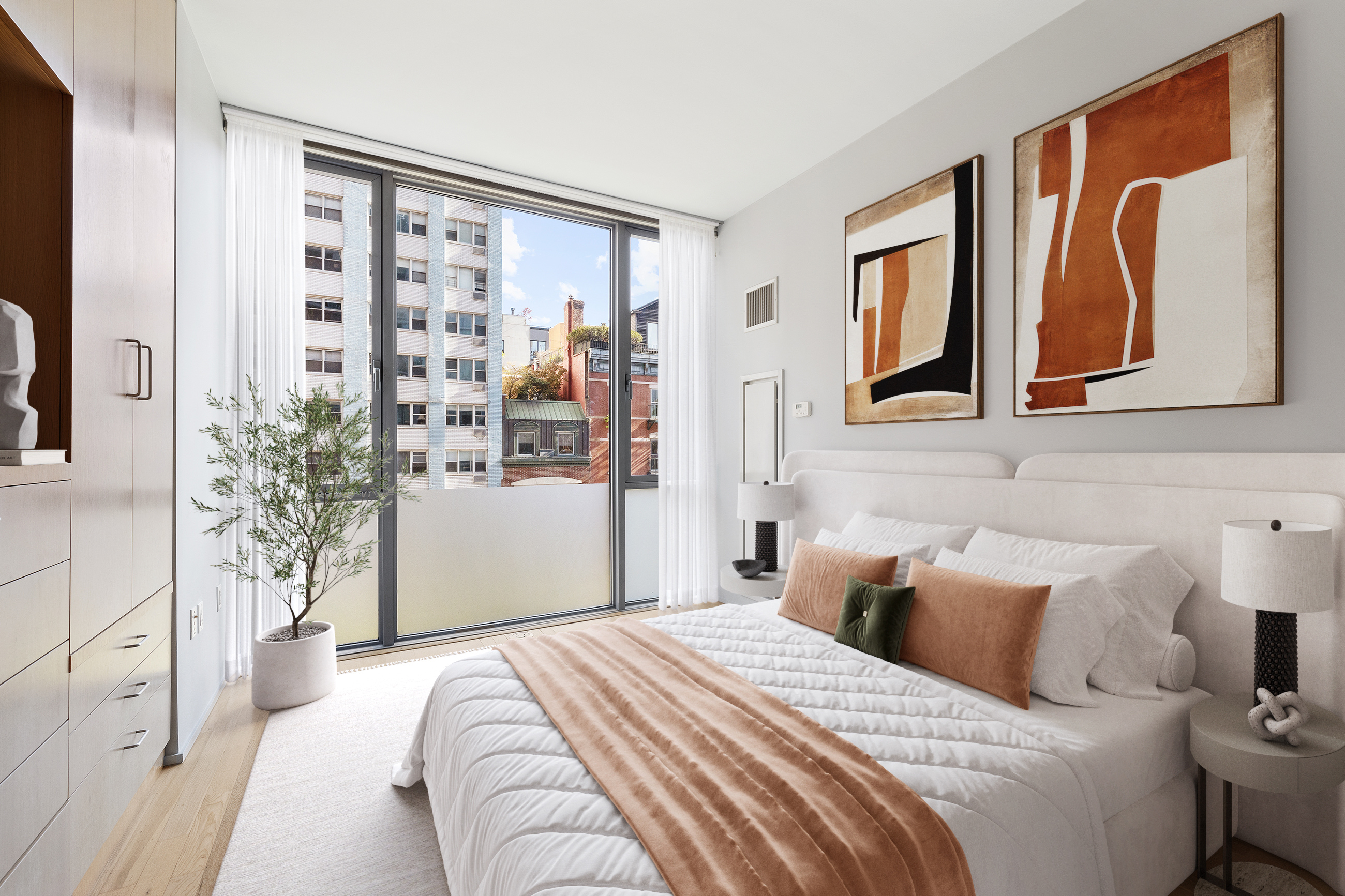 110 3rd Avenue, Unit 4C Manhattan, NY 10003 - Photo 9 of 17 a bedroom with a large bed and a window