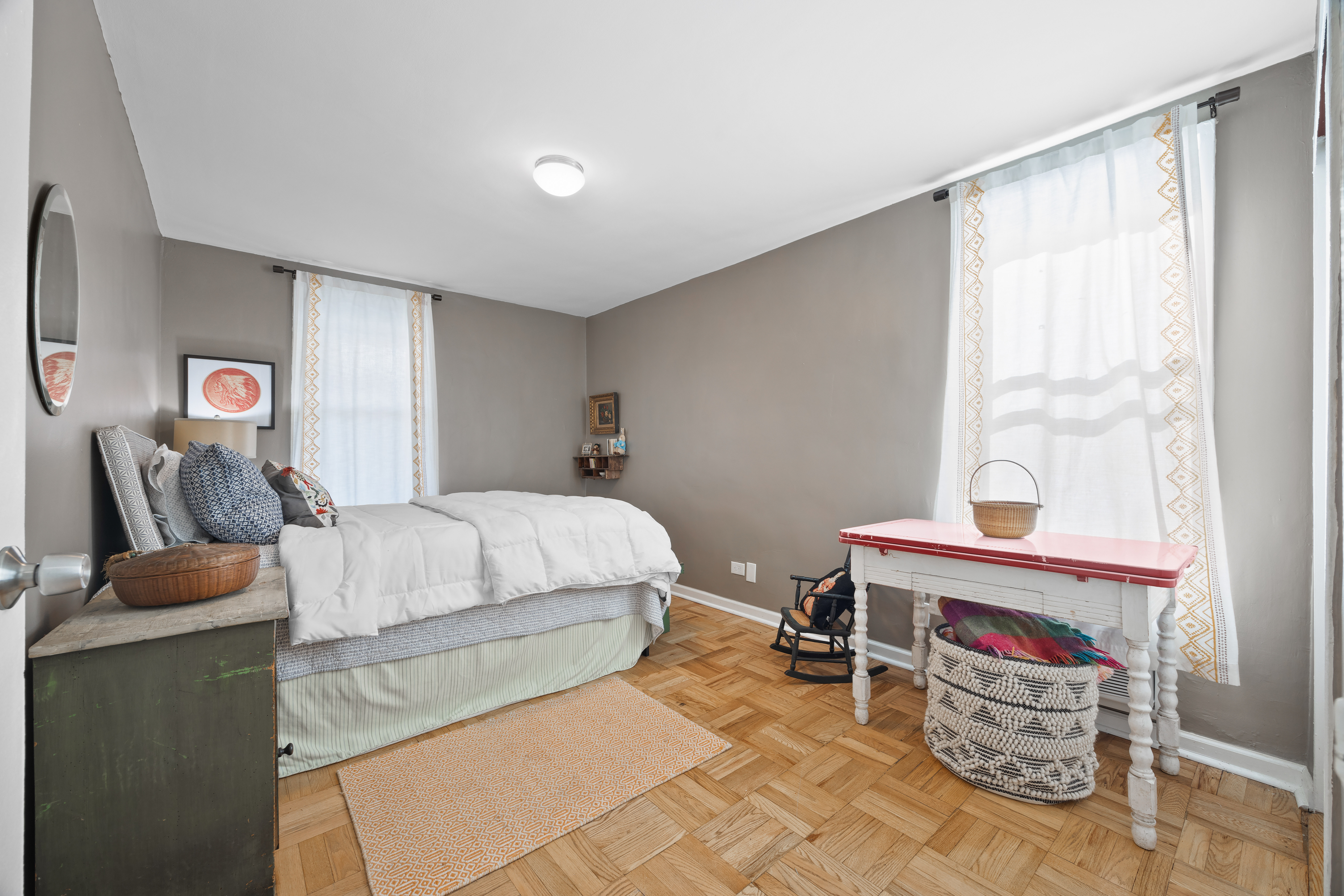 255 Fieldston Terrace, Unit 2L Bronx, NY 10471 - Photo 15 of 32 a bedroom with a bed and a window