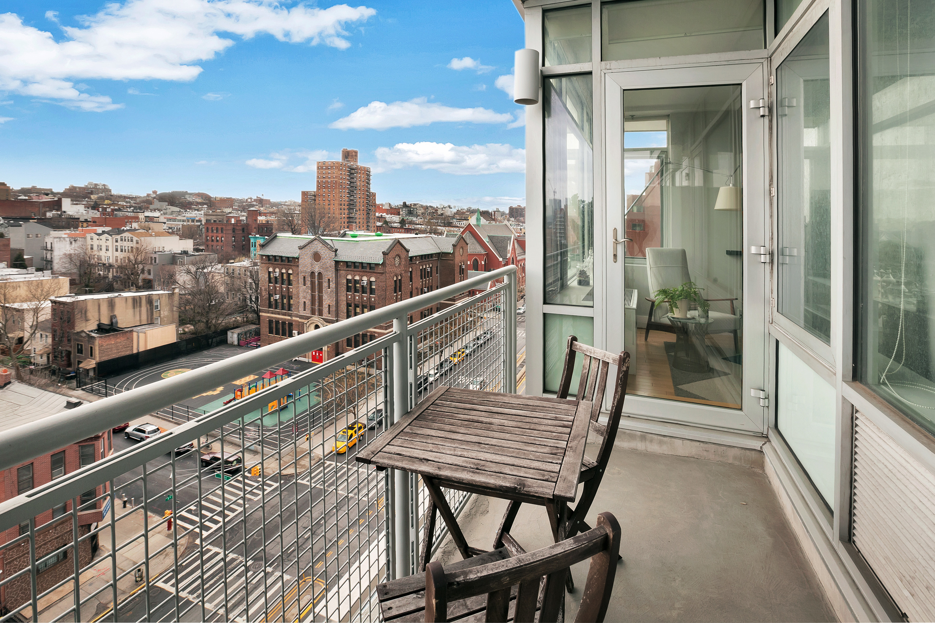 251 7th Street, Unit 10C Brooklyn, NY 11215 - Photo 4 of 15 a view of a balcony with furniture