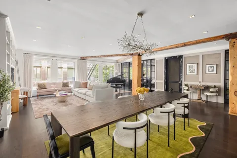 a view of a dining room and livingroom view