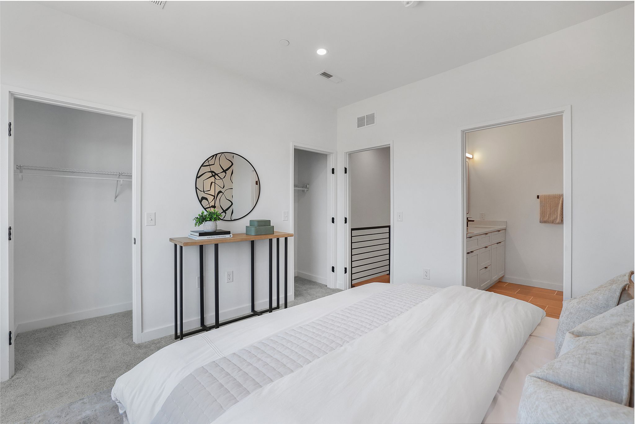 1036 Howard Road Southeast Washington, DC 20020 - Photo 32 of 41 a bedroom with a large bed and a chandelier