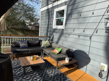 a view of a chairs on the deck