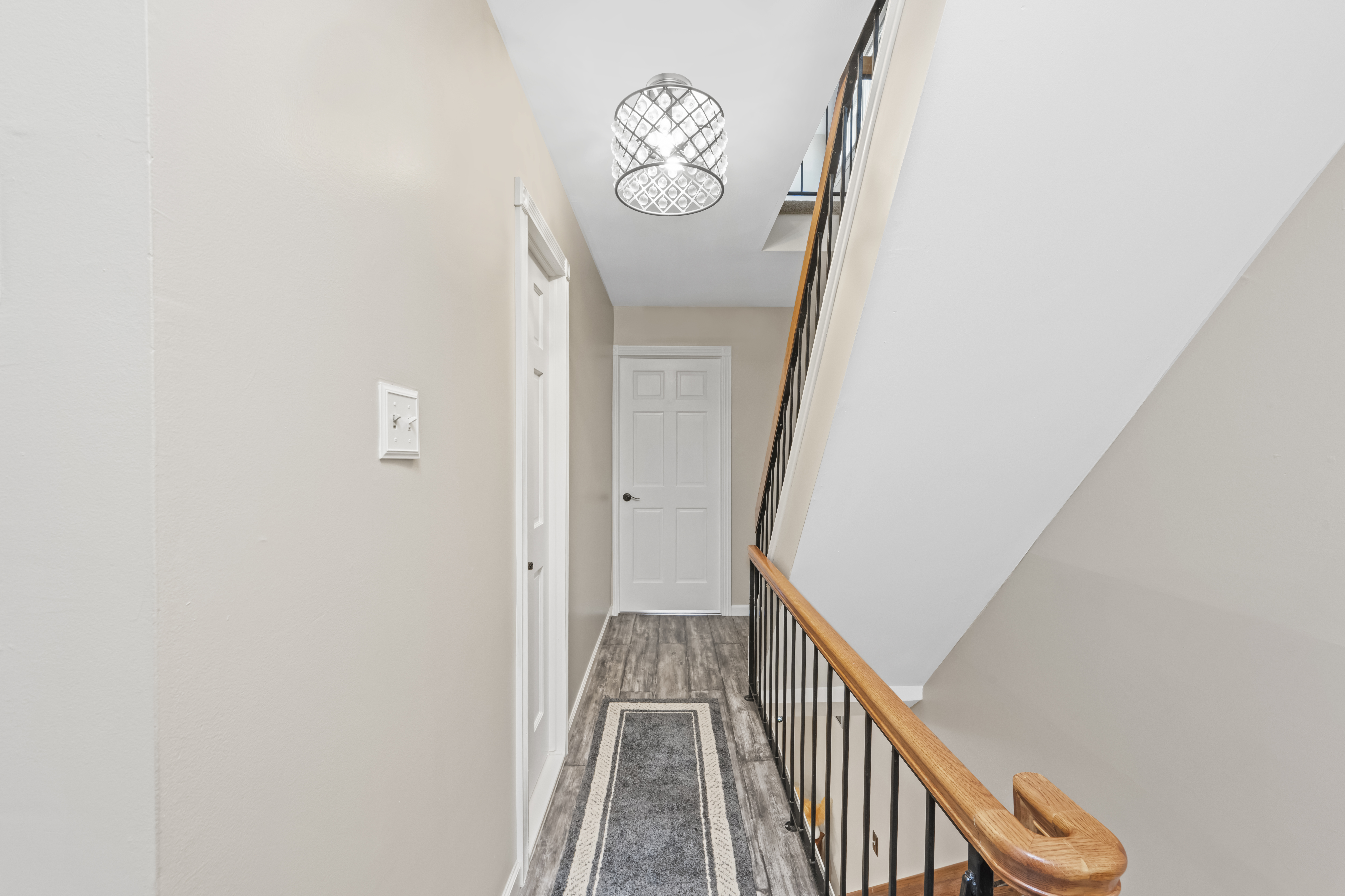 15 Hickory Circle Staten Island, NY 10312 - Photo 20 of 40 a view of a hallway with wooden floor