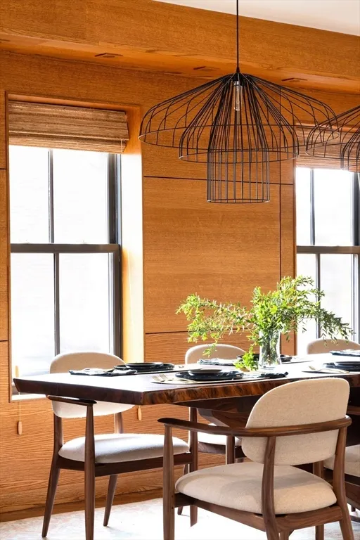 a room that has a table and a chair in it