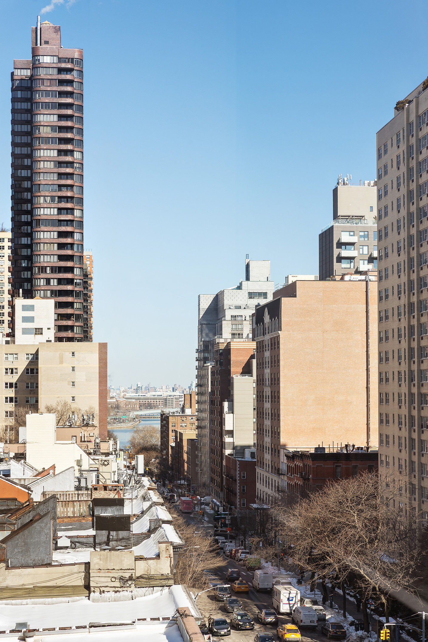 450 East 83rd Street, Unit 8B Manhattan, NY 10028 - Photo 15 of 22 a view of a city with tall buildings