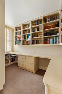 a room with furniture and window