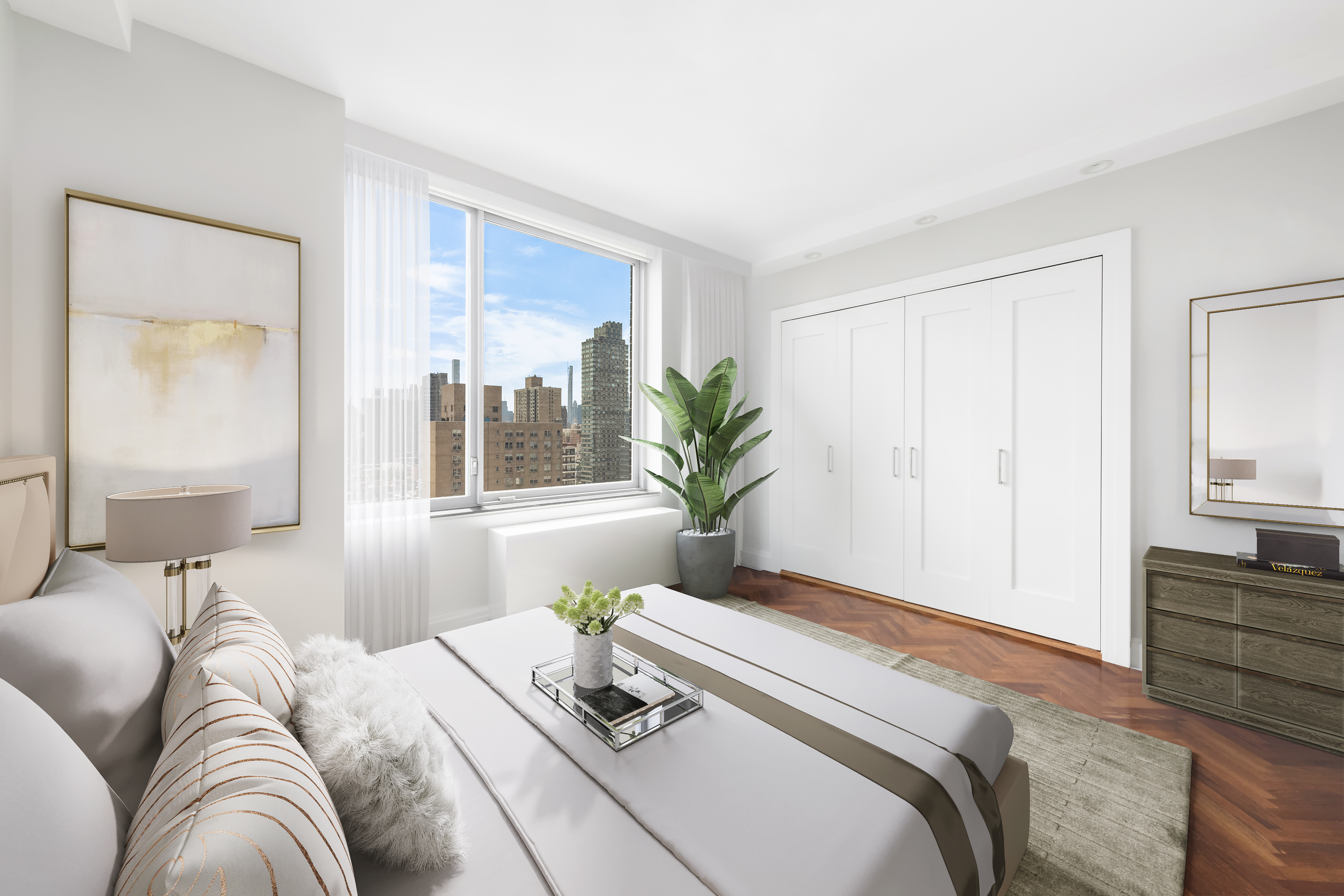 360 East 88th Street, Unit 20D Manhattan, NY 10128 - Photo 5 of 15 a bedroom with a large bed and a potted plant