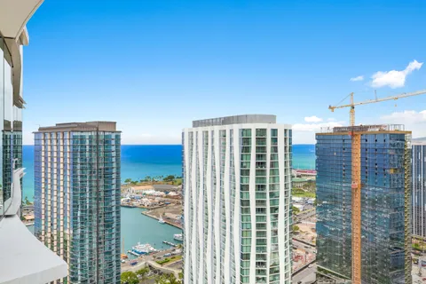 a view of a city with tall buildings