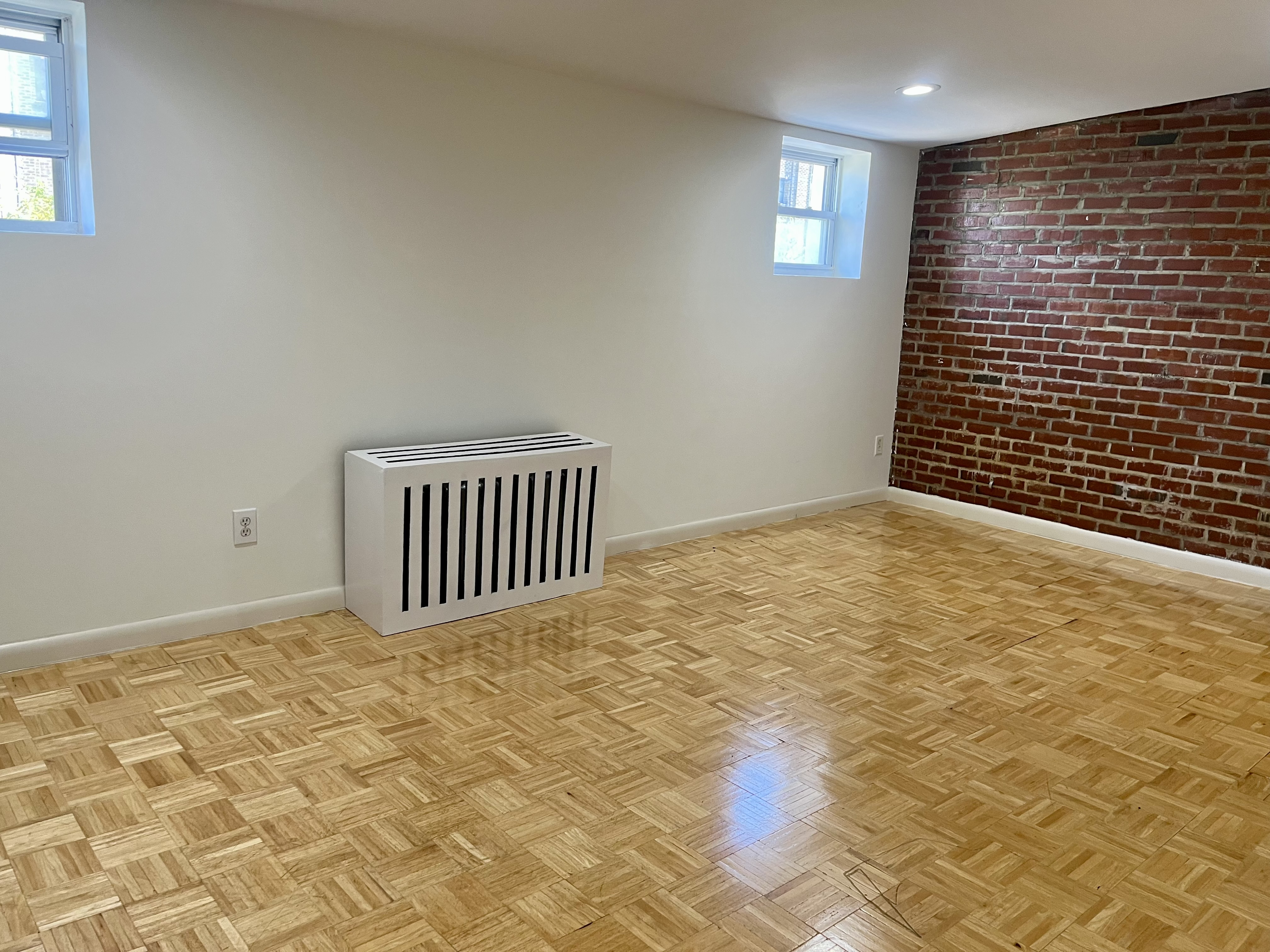 226 10th Street, Unit 3 Brooklyn, NY 11215 - Photo 3 of 10 a view of an empty room with a window