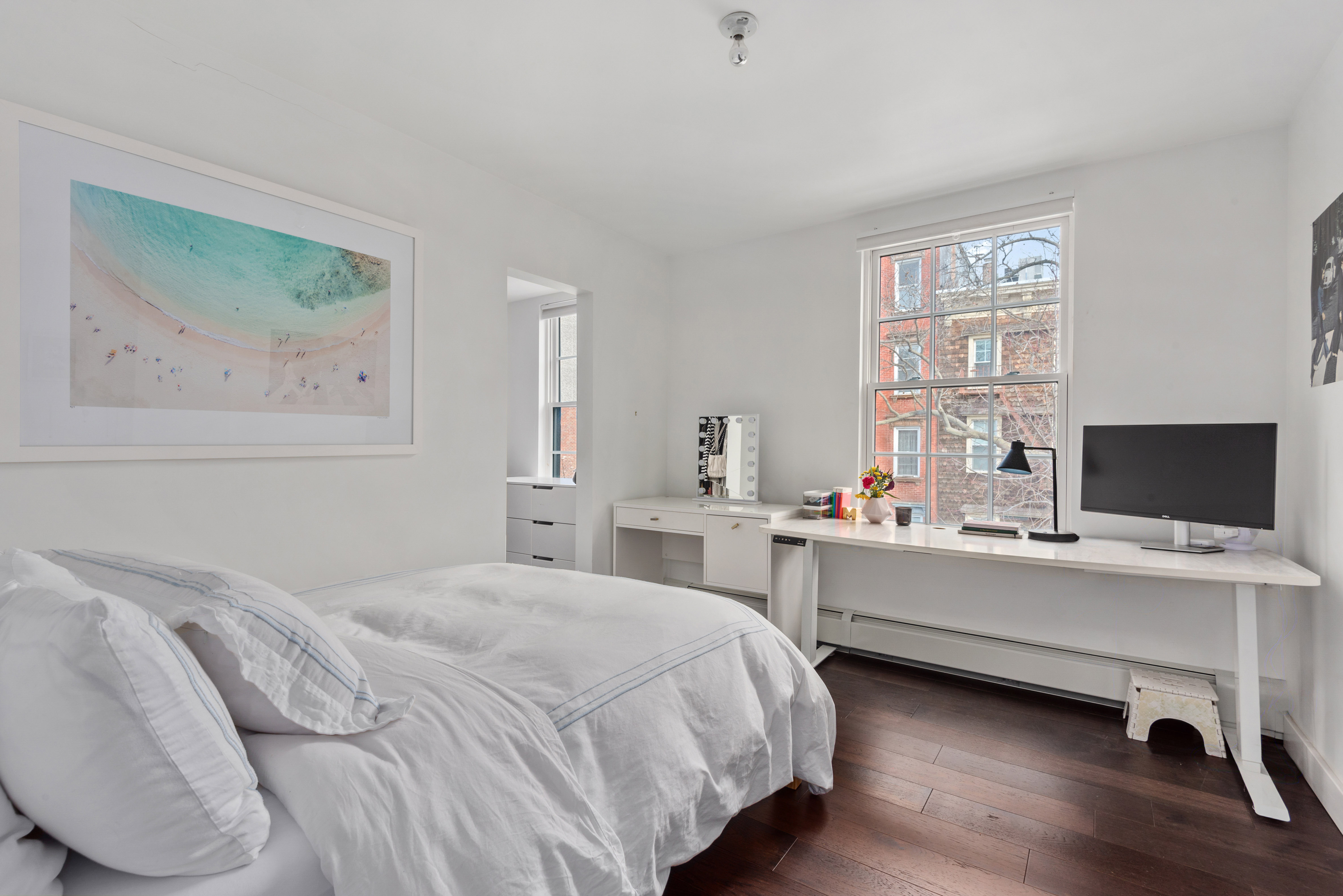 110 North 9th Street, Unit TH1 Brooklyn, NY 11249 - Photo 5 of 14 a bedroom with a bed and a desk