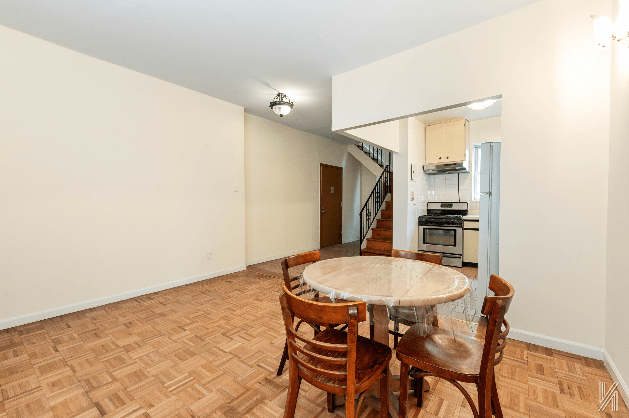 32-10 35th Street Queens, NY 11106 - Photo 4 of 29 a view of a dining room with furniture