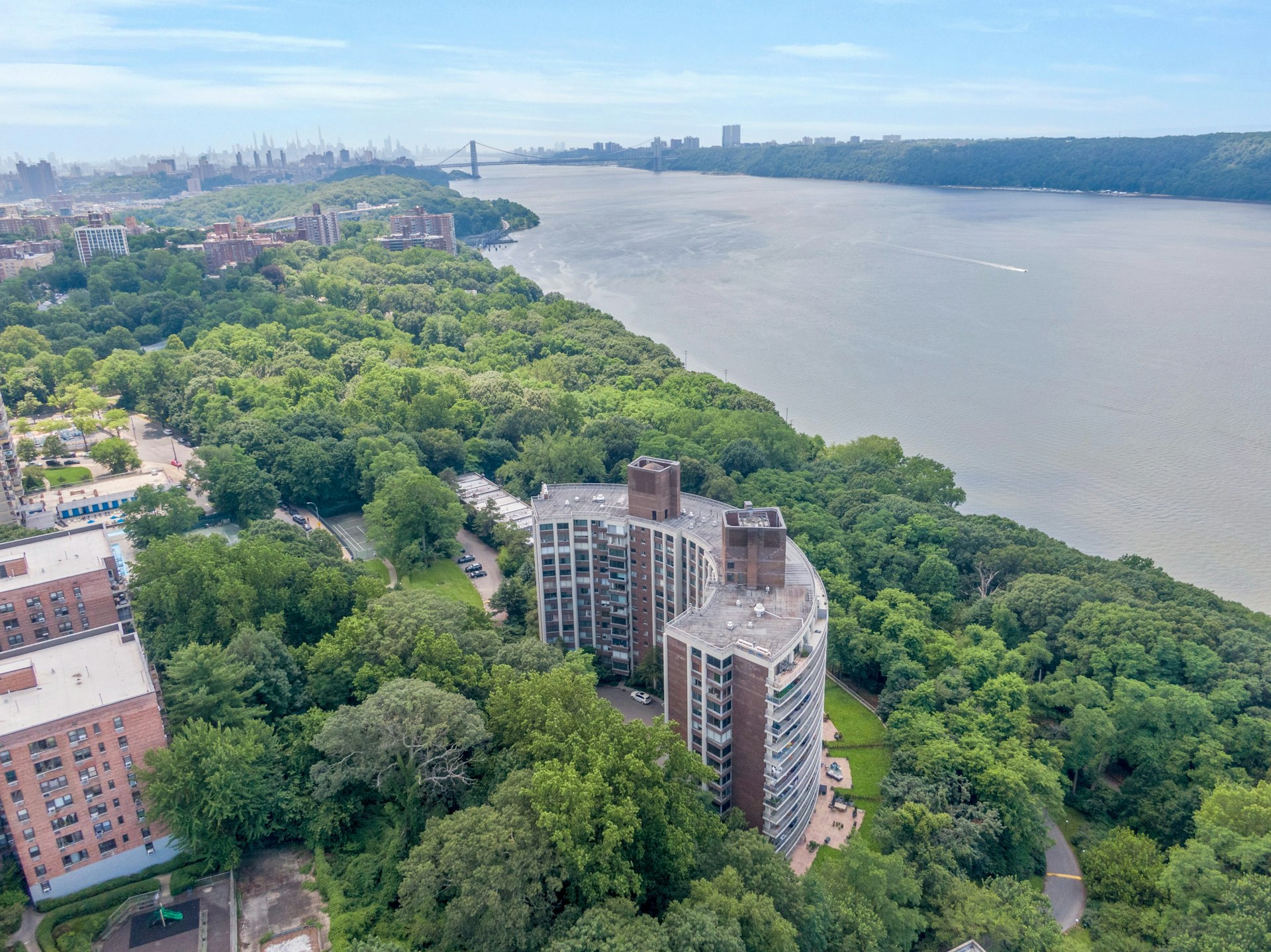 4455 Douglas Avenue, Unit 3F Bronx, NY 10471 - Photo 18 of 27 an aerial view of a house with a garden and lake view