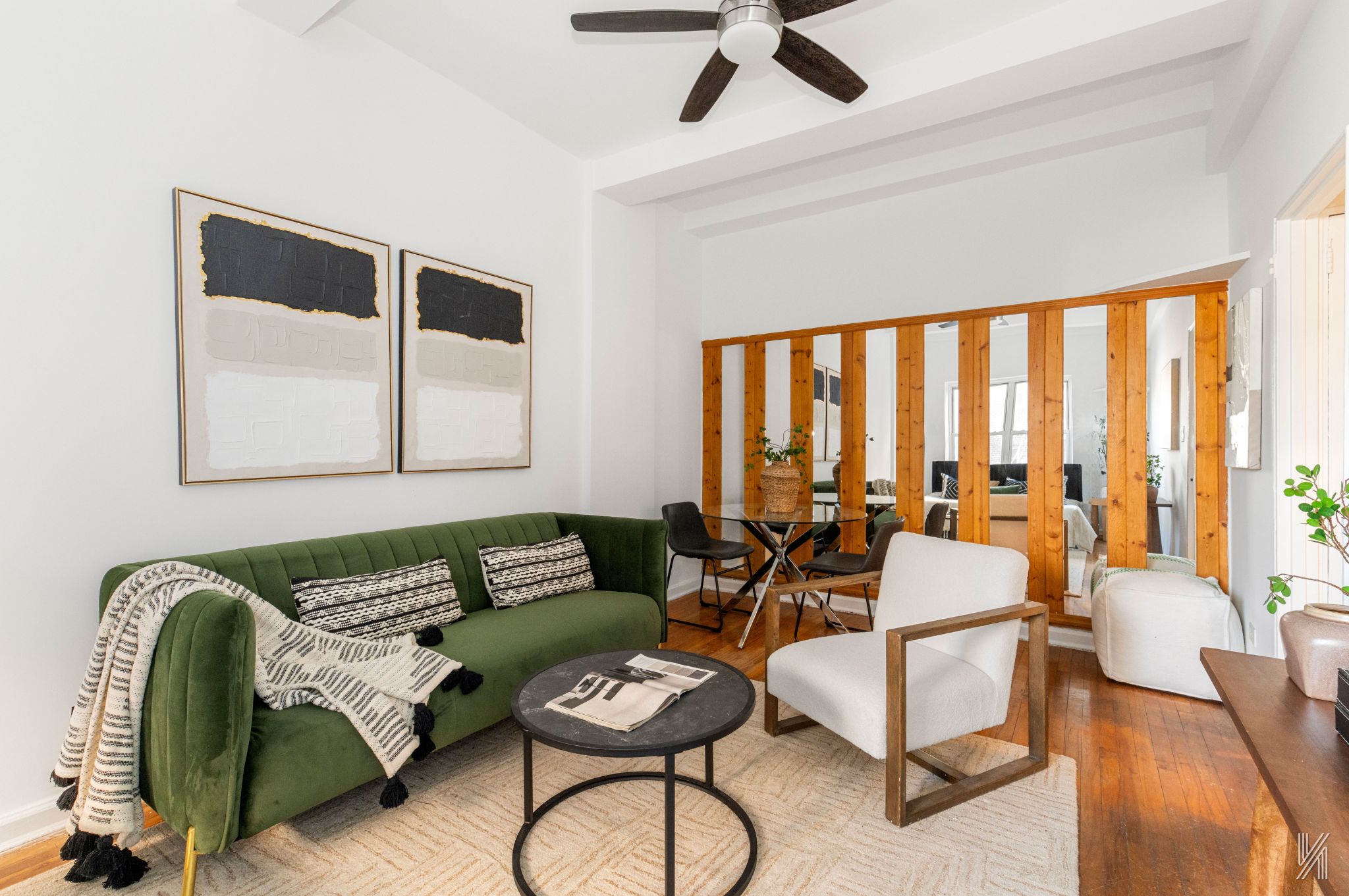 39-30 52nd Street, Unit GA Queens, NY 11377 - Photo 4 of 15 a living room with furniture and a large window