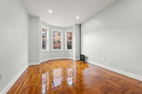 $1,495,000 | 2023 Hughes Avenue | East Tremont