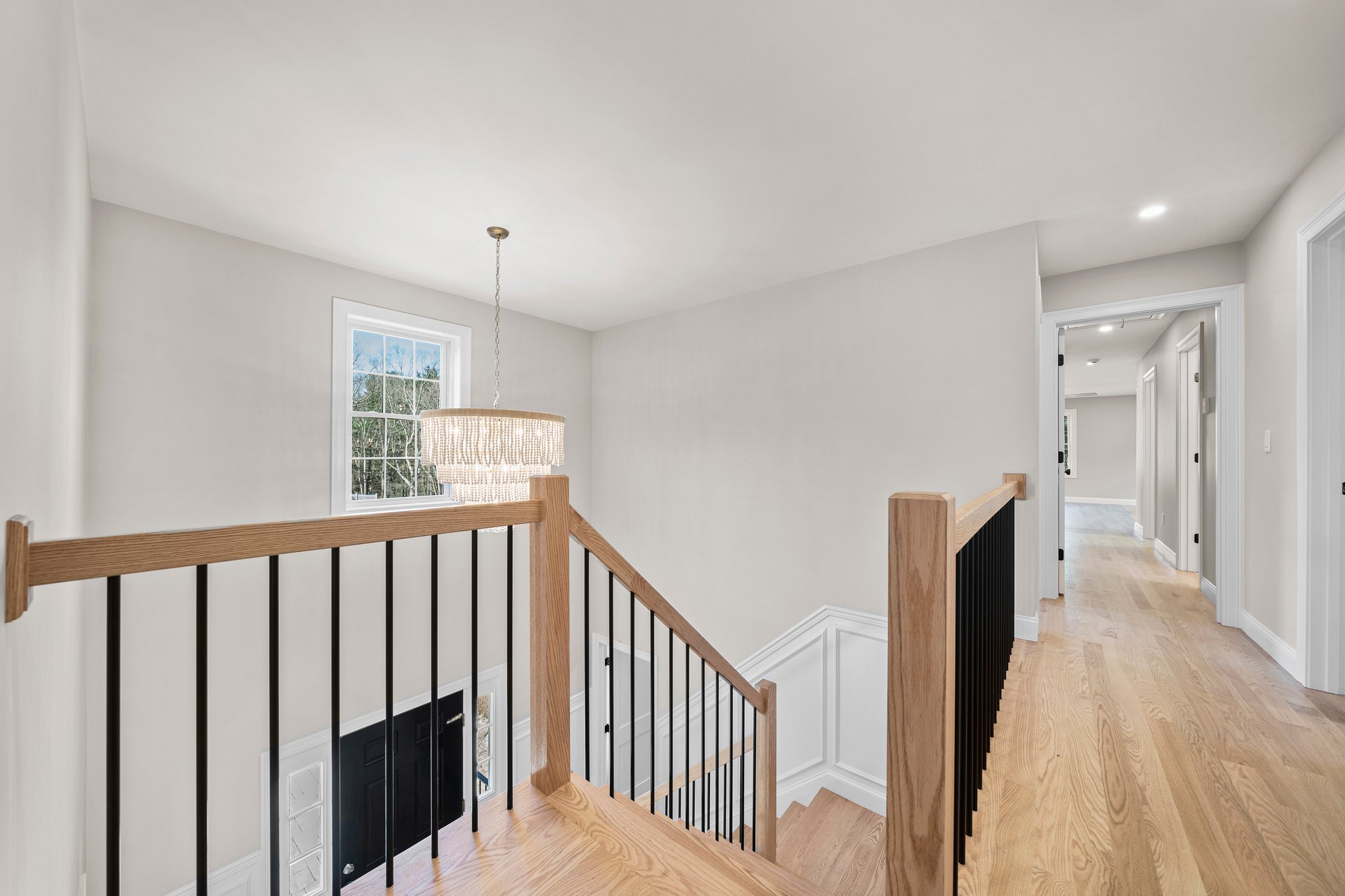 3 Everendon Road Canton, MA 02021 - Photo 17 of 35 a view of a hallway with wooden floor and staircase