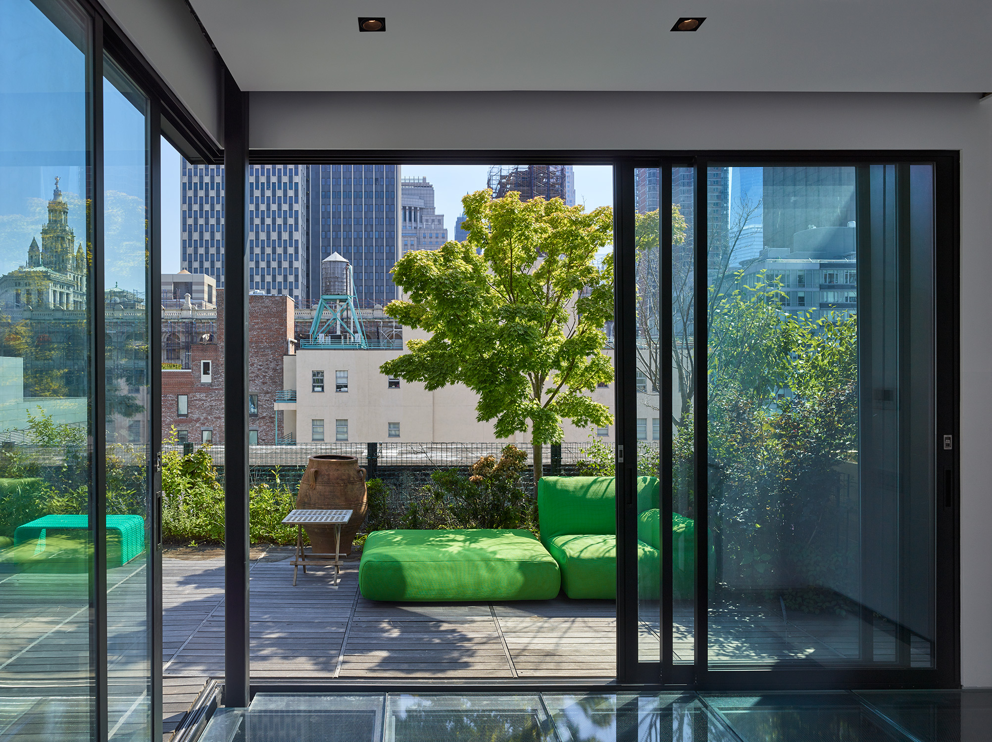 366 Broadway, Unit PHC Manhattan, NY 10013 - Photo 2 of 15 a front view of a house with a yard