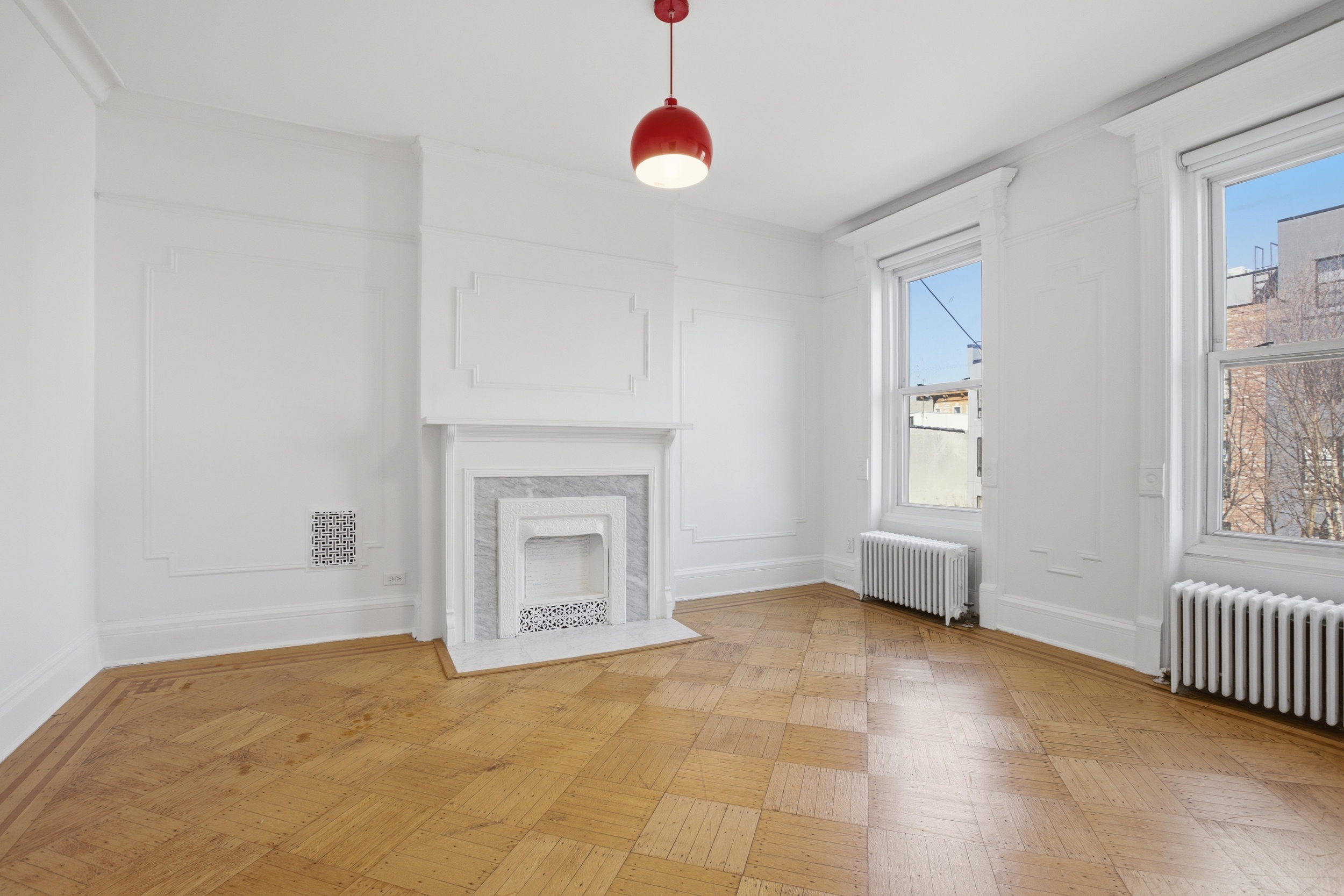 611 Macon Street Brooklyn, NY 11233 - Photo 9 of 15 a view of empty room with fireplace