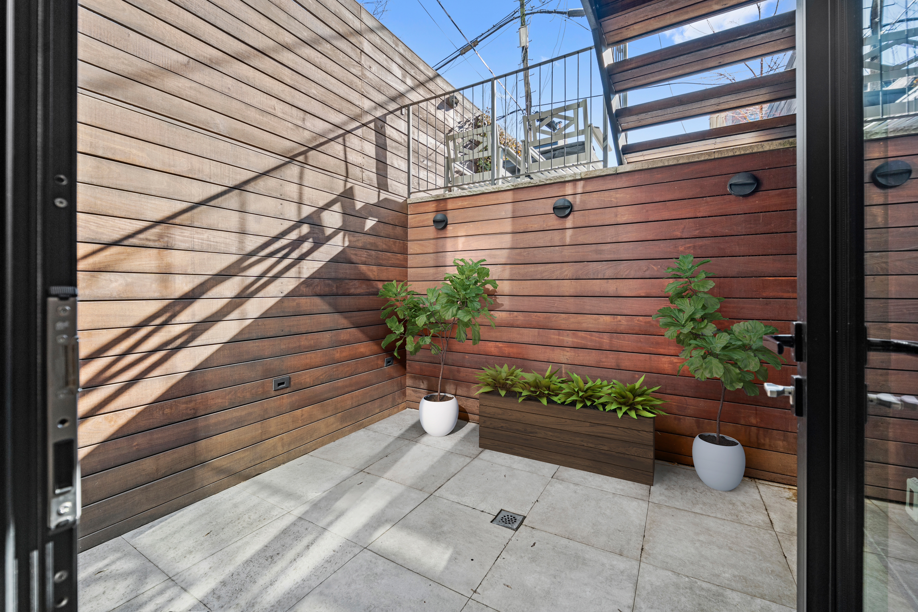 88 Lexington Avenue, Unit 1A Brooklyn, NY 11238 - Photo 10 of 13 a view of a backyard with sitting area