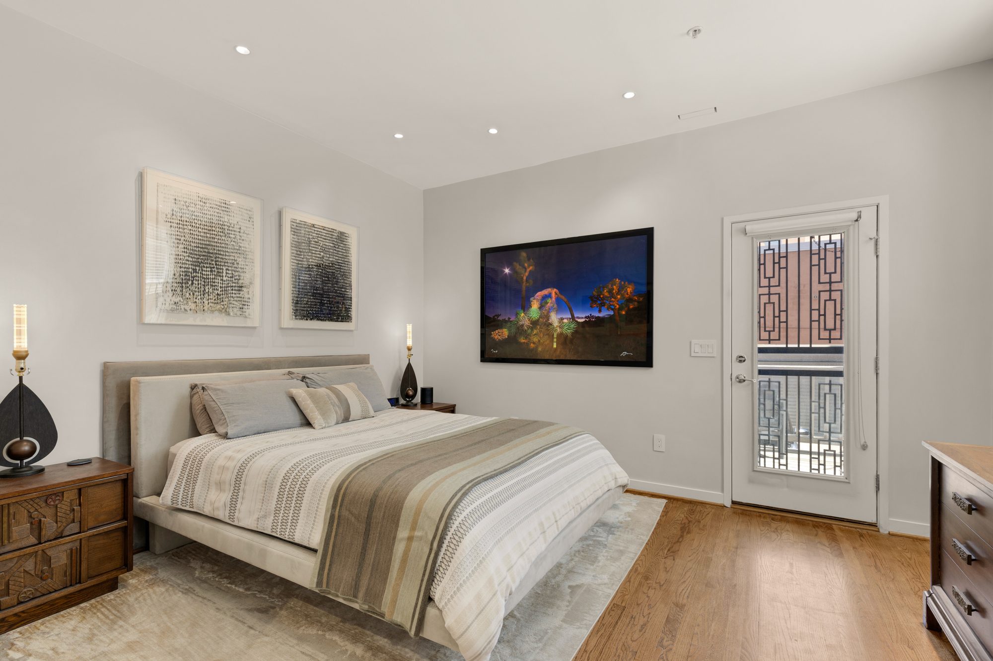 1407 15th Street Northwest, Unit 2 Washington, DC 20005 - Photo 13 of 24 a bedroom with a bed and a tv on table