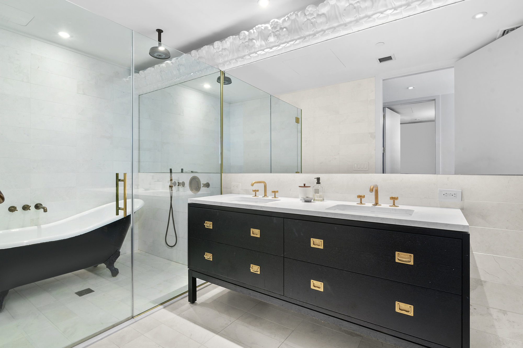 93 Worth Street, Unit 1006 Manhattan, NY 10013 - Photo 9 of 18 a bathroom with a double vanity sink and a mirror