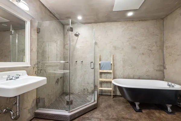 a bathroom with a sink and mirror
