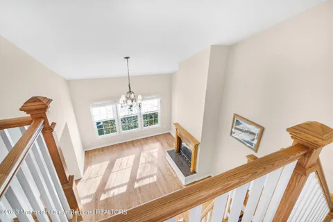a view of a hallway with windows