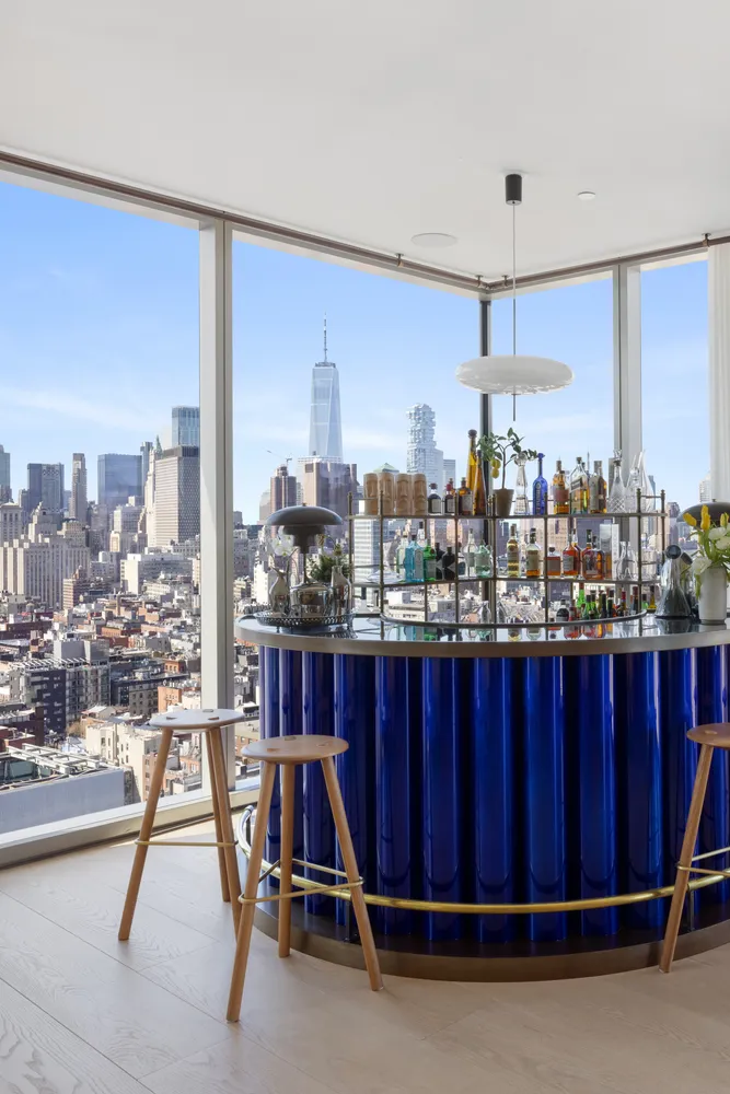 a view of a dining room and furniture window and wooden floor
