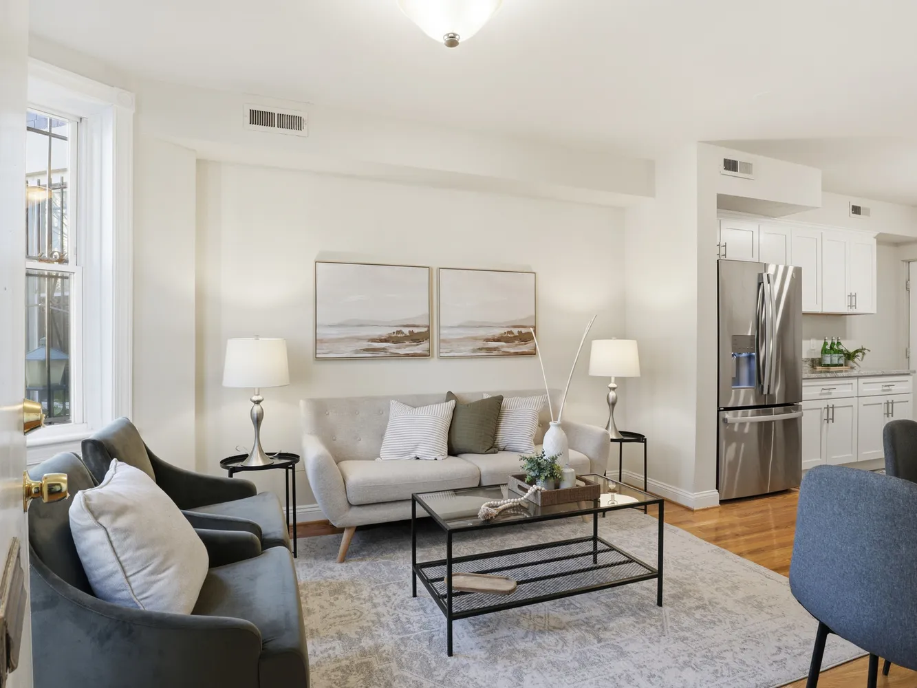 a living room with furniture and a rug