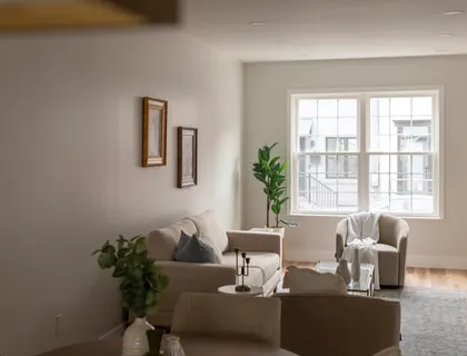 a living room with furniture and a couch