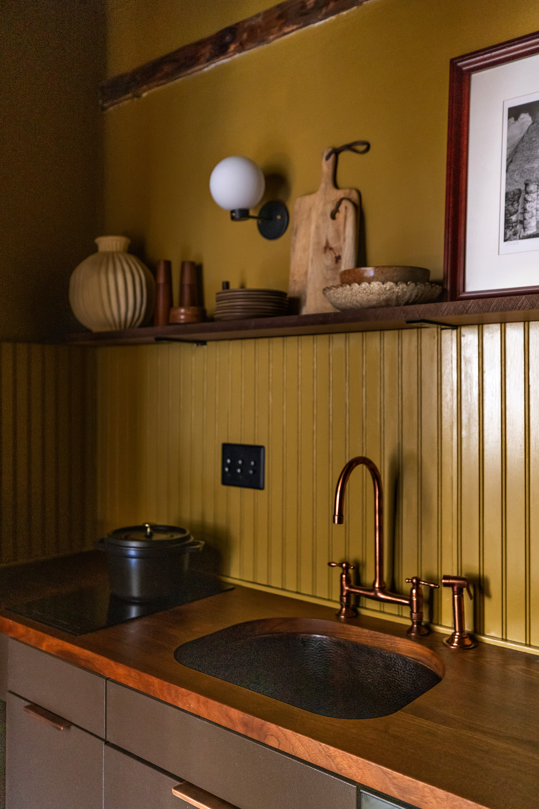 207 West 21st Street, Unit 3F Manhattan, NY 10011 - Photo 8 of 12 a close view of a sink a counter space and a potted plant