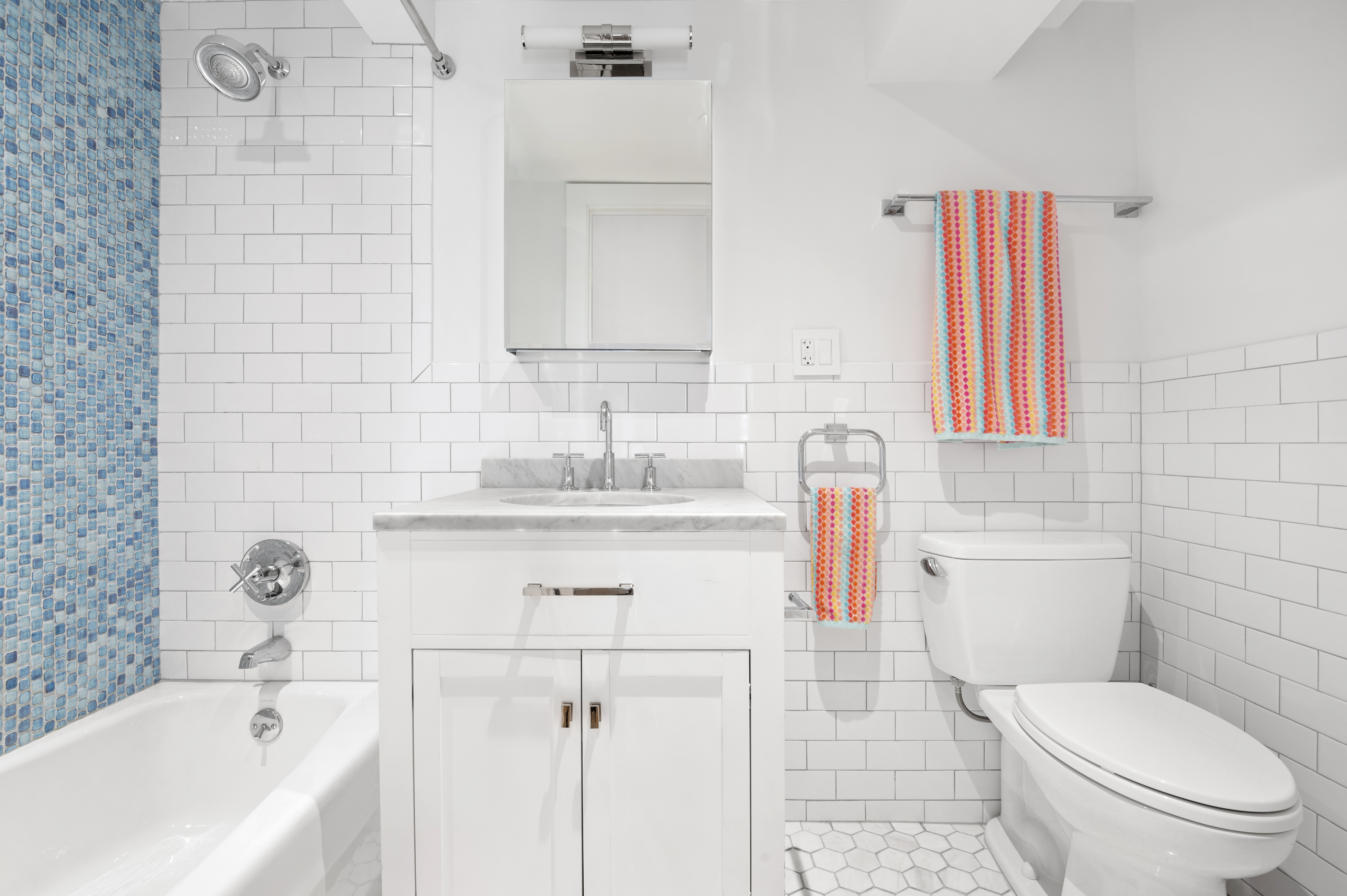 185 East 31st Street Brooklyn, NY 11226 - Photo 12 of 23 a bathroom with a sink toilet vanity and tub