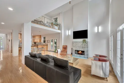 a view of room with window and hardwood floor