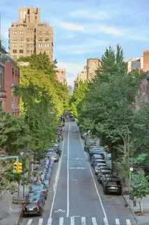 a view of a city with tall buildings